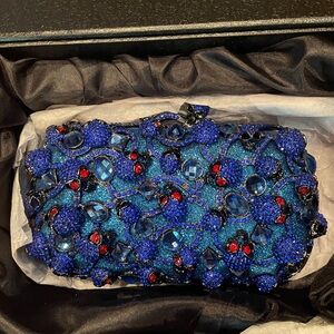 NWT Designer Stefano Laviano Swarovski Crystal Skull Clutch Purse: Blue w/ Red